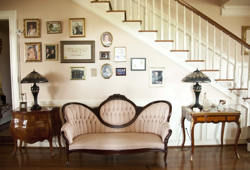 sitting sofa by stairs